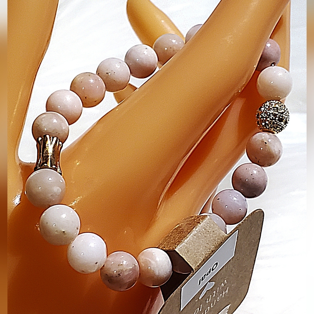 Elegant Pink Opal Beaded Bracelet with Gold Tone Accents.